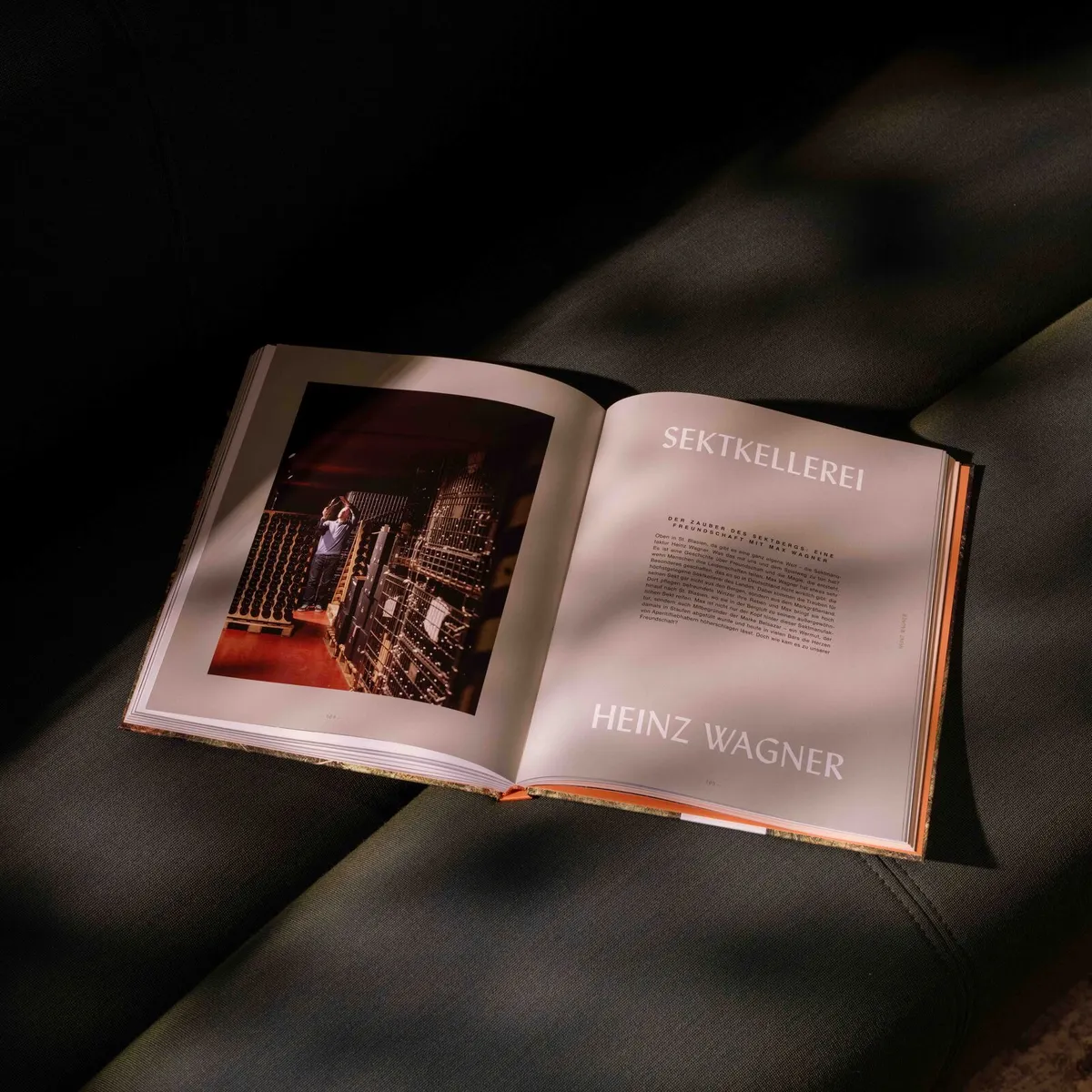 Open cookbook by Viktoria Fuchs showing a page about the Heinz Wagner winery